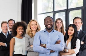 African American Businessman Boss With Group Of Business People In Creative Office