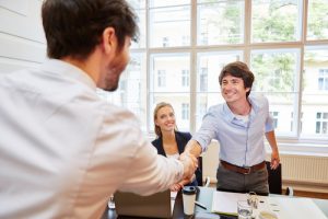 Business people shaking hands